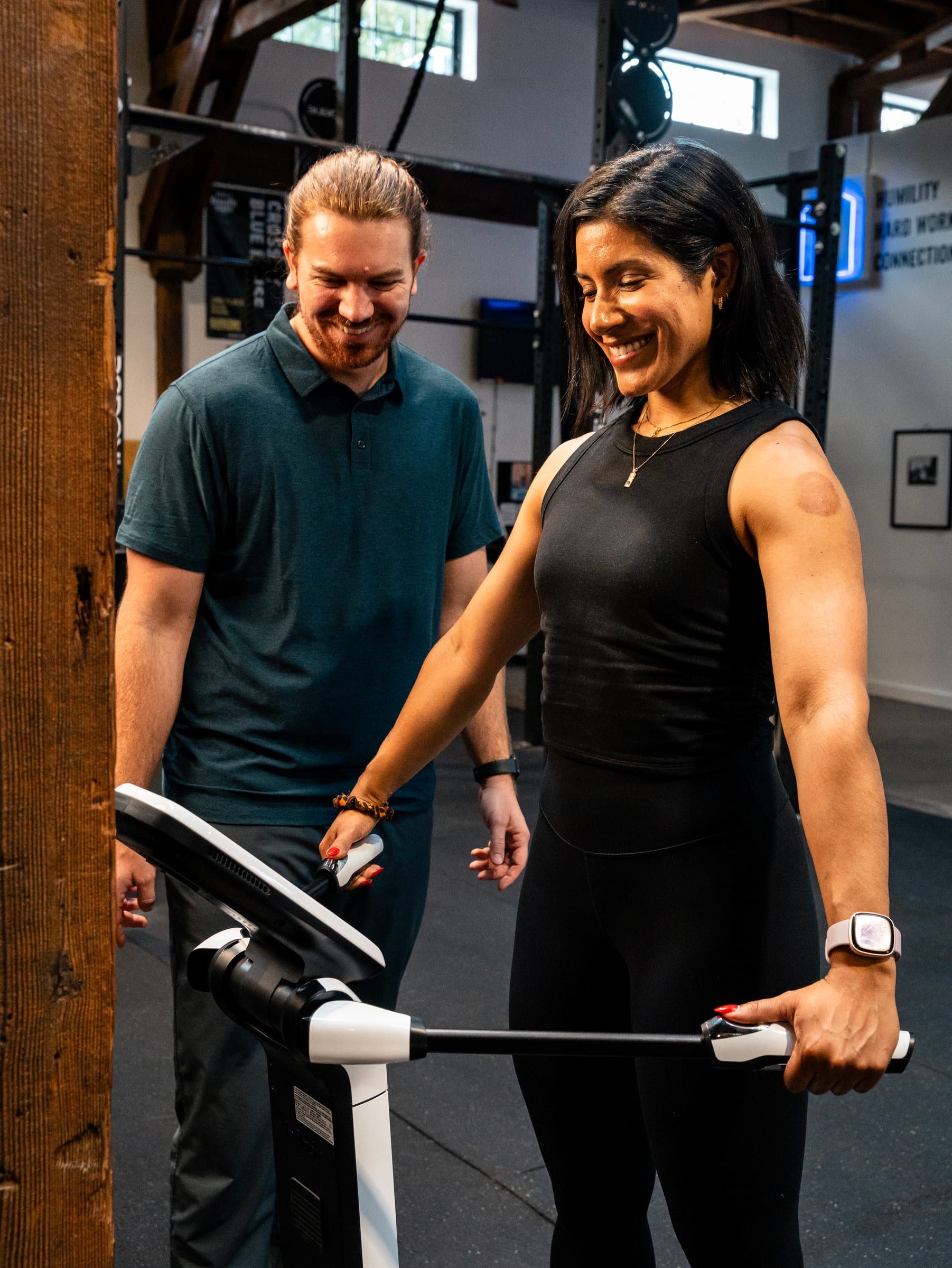 Client on an InBody body composition scanner with Adam Wilson